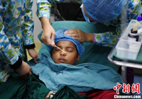 跨国救援爱心接力 尼泊尔男孩合肥手术留住光明